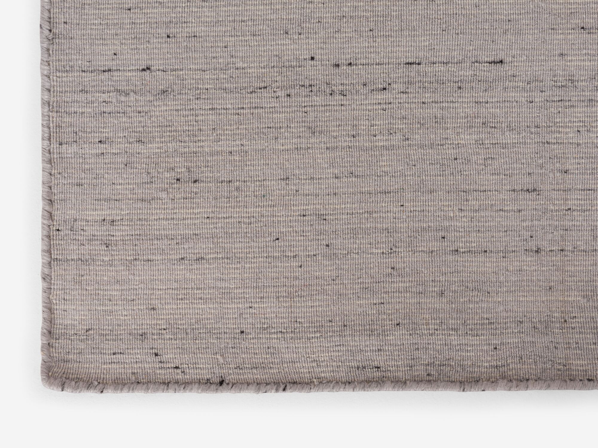 Large grey woven area rug detail view